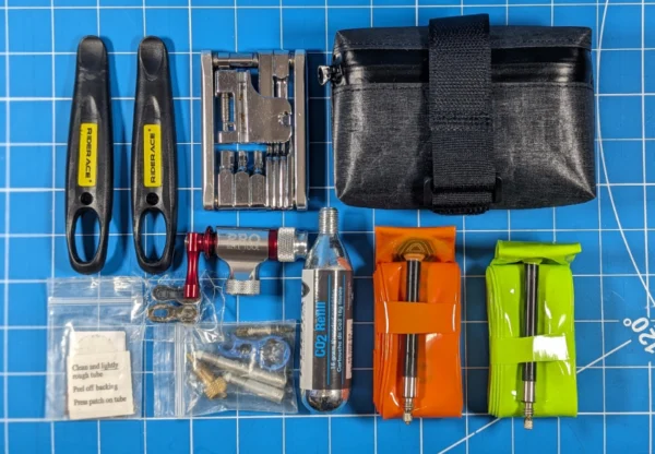 Compact and durable bike saddle bag designed for road and mountain bike adventures.