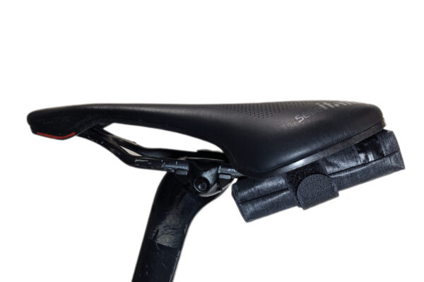 Low-profile bike saddle bag with a compact, lightweight design and custom sizing options.