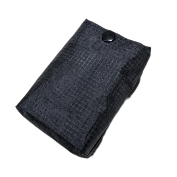 A waterproof bike saddle bag enduring rainy conditions, keeping your gear dry and safe.