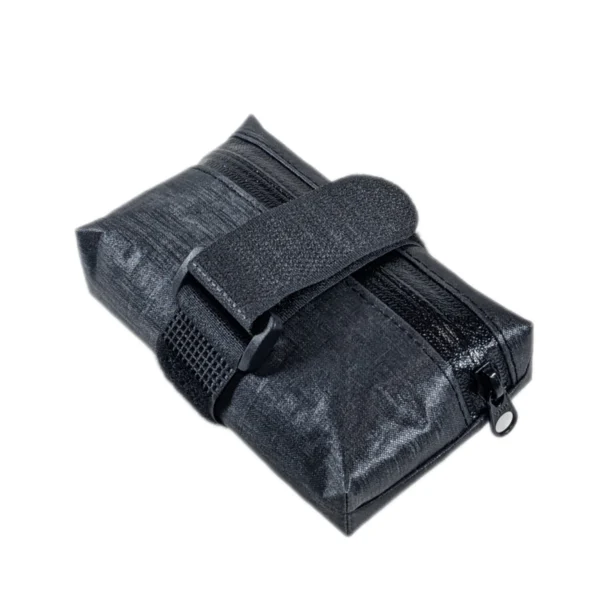 Sleek and low-profile bike saddle bag with a minimalist design and secure Velcro