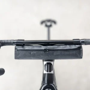 Minimalist lightweight bike handlebar and frame bag, designed for efficient storage and a sleek look.