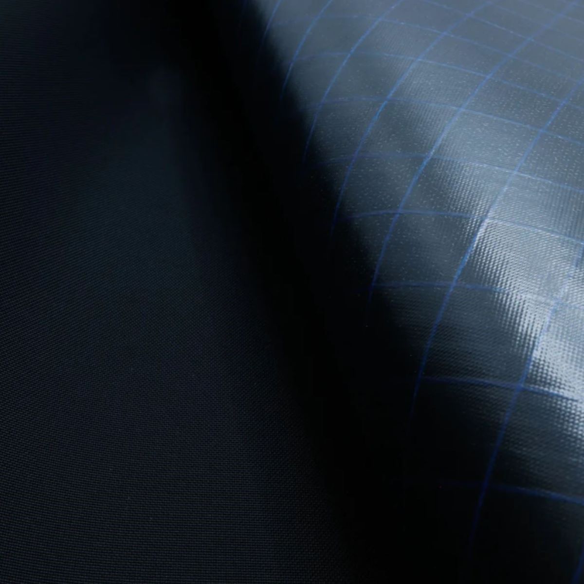 EcoPak EPLX400 Black Knight fabric with plastic laminate backing, waterproof, rugged, and wear-resistant.