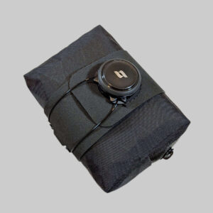 Compact mini bike saddle bag with BOA-style rotary tightening system and low-profile aero design.