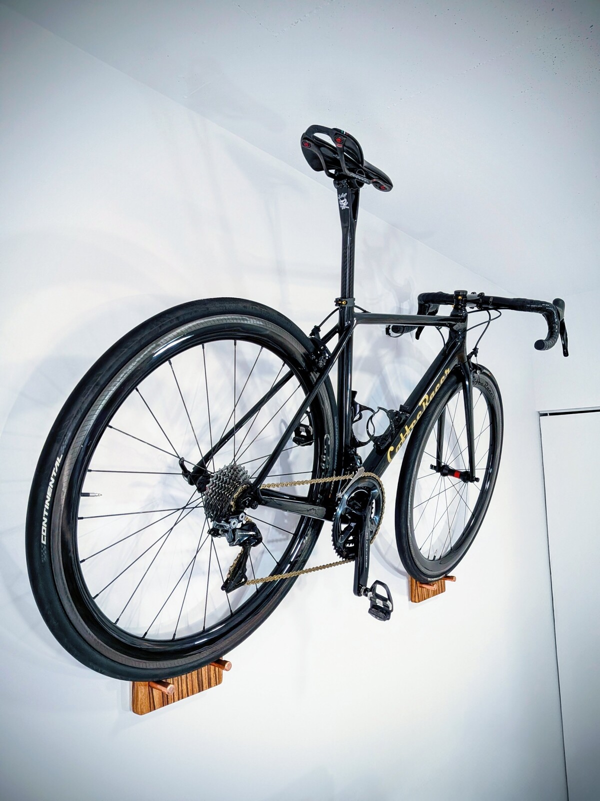 Handmade wooden bike wall mount for road bike storage