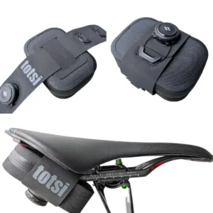 Small saddle bag with BOA-style rotary dial attachment shown on a bike saddle and off-bike product display.